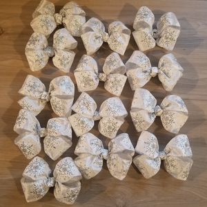 Set of 13 Christmas bows for decor. Used once.